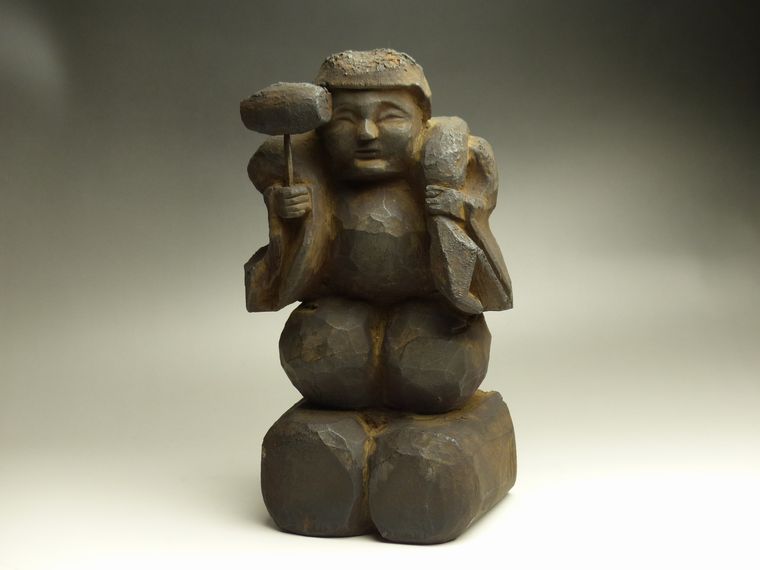 表情に魅力のある 大黒天木彫